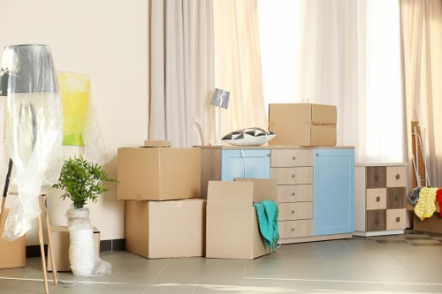 Urgent removal team loading furniture for a same-day move in Ealing