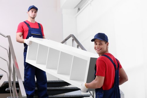 Removal van and moving boxes for a home move in Ealing