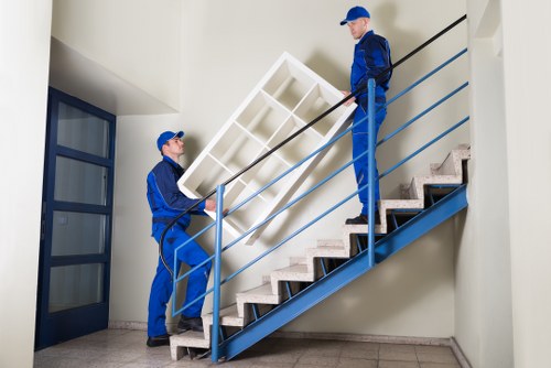 Careful furniture handling during a home move in Ealing