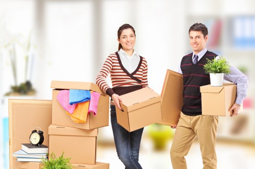 Charity donation boxes and furniture set aside for reuse