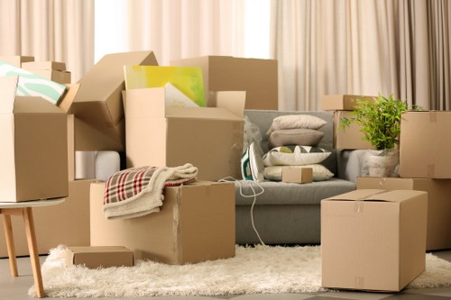 Careful loading of furniture into a removals vehicle in Ealing
