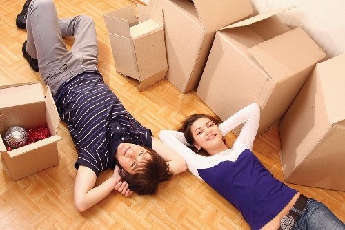 Commercial removals team transporting office items in West London
